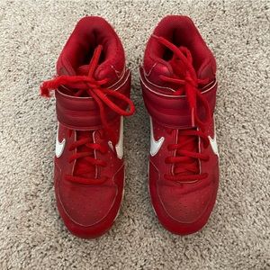 Youth Nike red size 4.5 baseball cleats